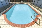 Relax in the private pool accessible only by residents -clear waters serviced weekly-